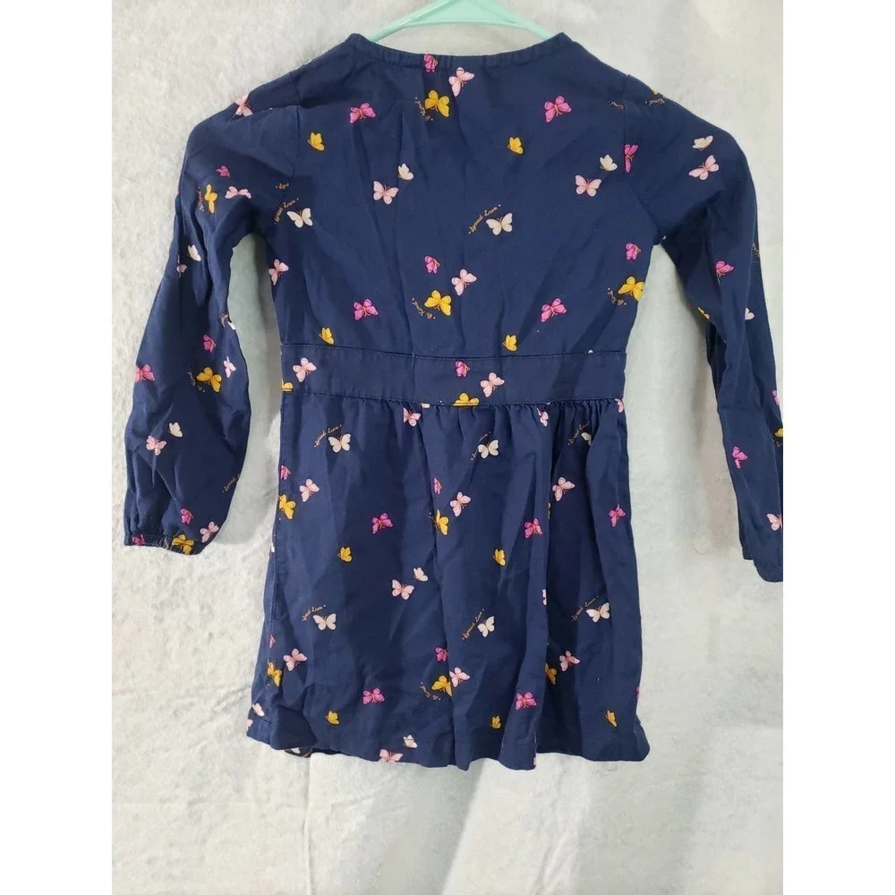 Carter's navy blue/butterflies size 6 dress. Faux tie detail.
